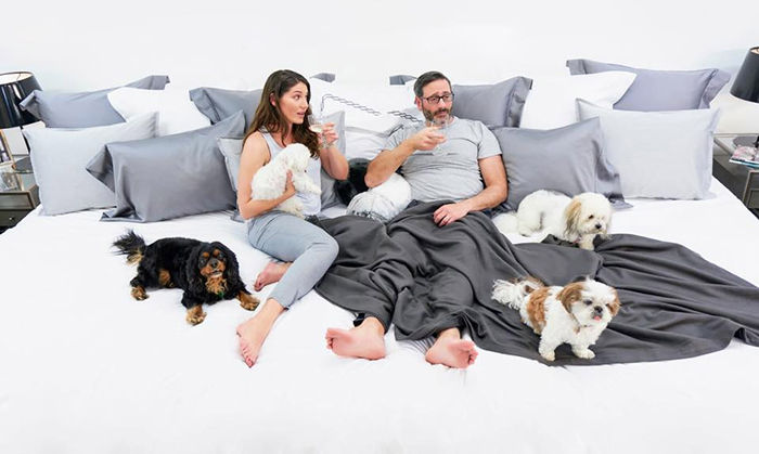 4 Couple-with-Four-Dogs-on-Ace-Collection-12-foot-Bed