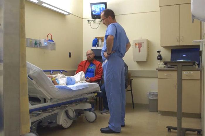 Dr.-Robert-Parry-visits-a-patient